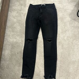 Black Stretch Knee Distressed and Fringe Cut at Bottom Pocket Jeans